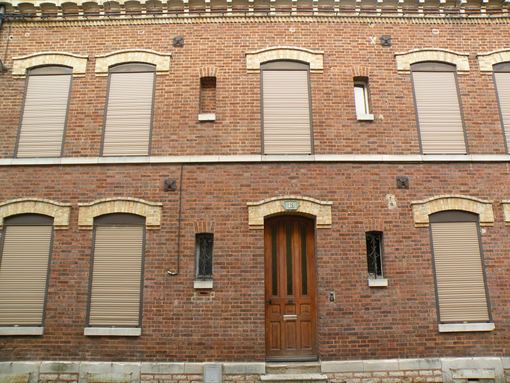  grande maison en brique, rue Beaujean